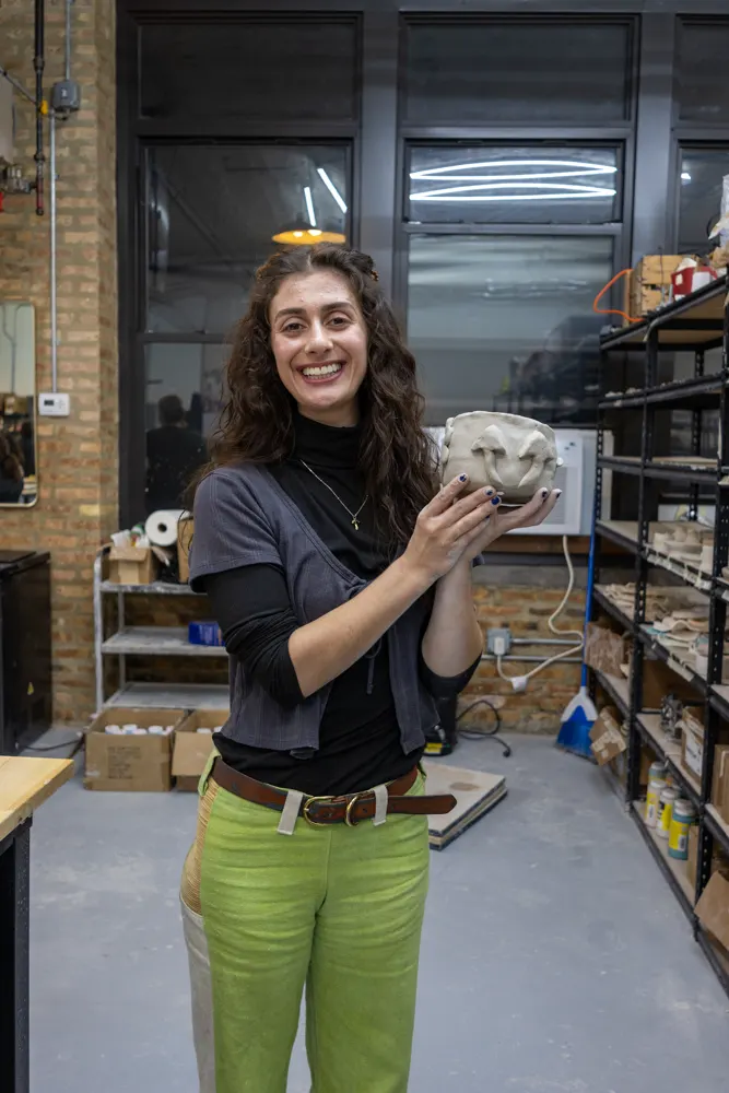Chicago Girls Who Walk members with their pottery at a past social at The Pottery Loop