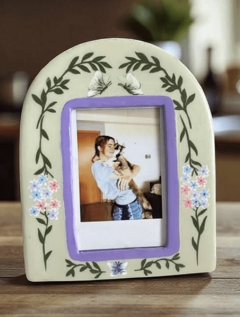 A handbuilt ceramic photo frame
