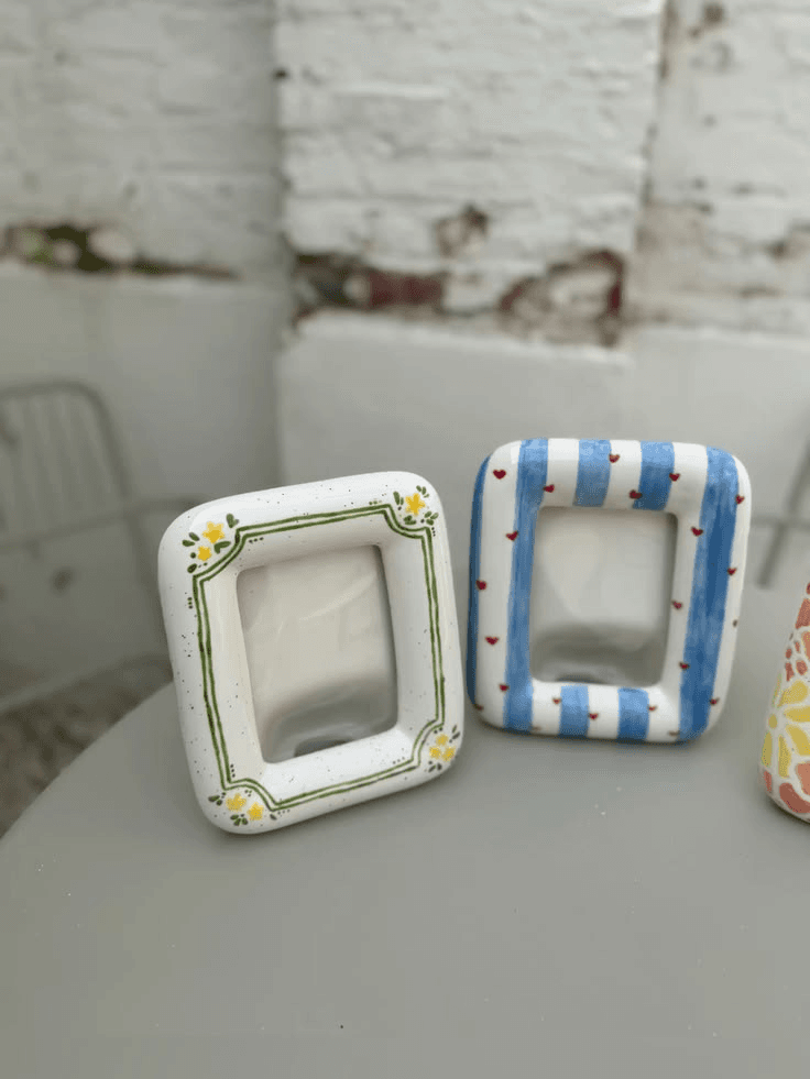 A handbuilt ceramic photo frame