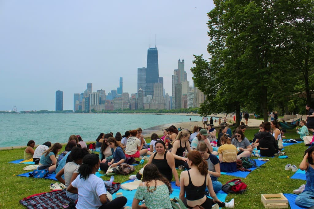 Glazing pottery by the lake at North Ave Beach with the Chicago skyline