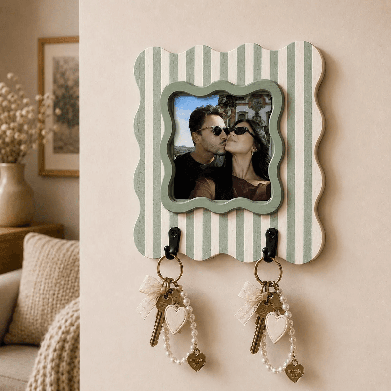 A wavy striped ceramic photo frame hanging on a wall